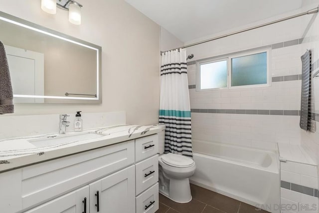 full bathroom featuring shower / bath combination with curtain, vanity, toilet, and tile patterned flooring