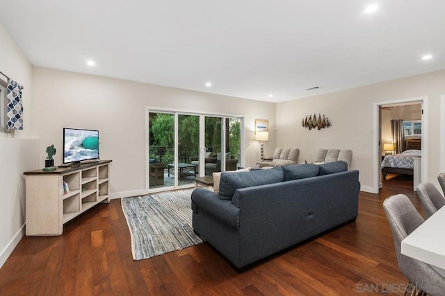 living room featuring dark wood-type flooring