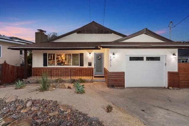 view of front of home with a garage