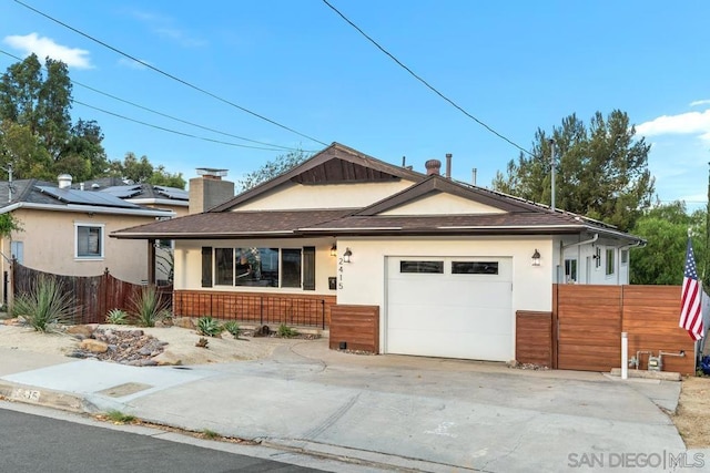 view of front of home with a garage