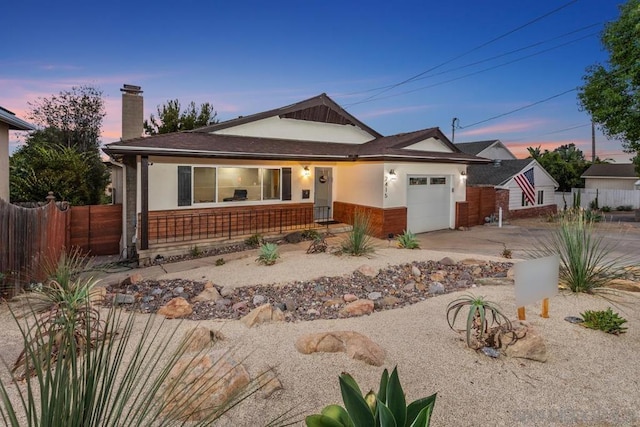 view of front of property with a garage