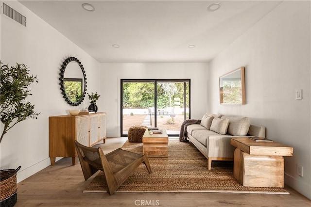 sitting room featuring hardwood / wood-style flooring