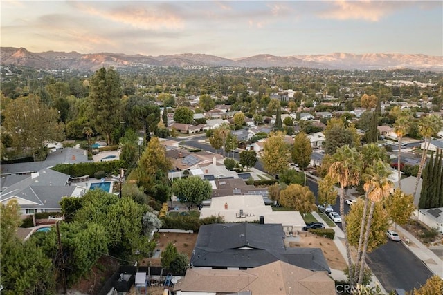 aerial view at dusk with a mountain view