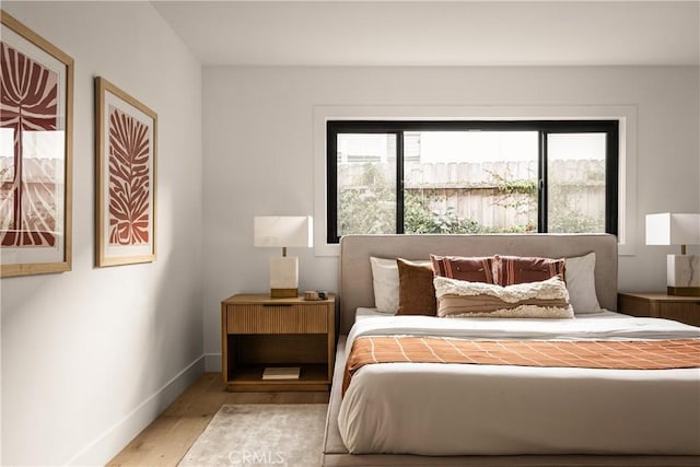 bedroom featuring light wood-type flooring