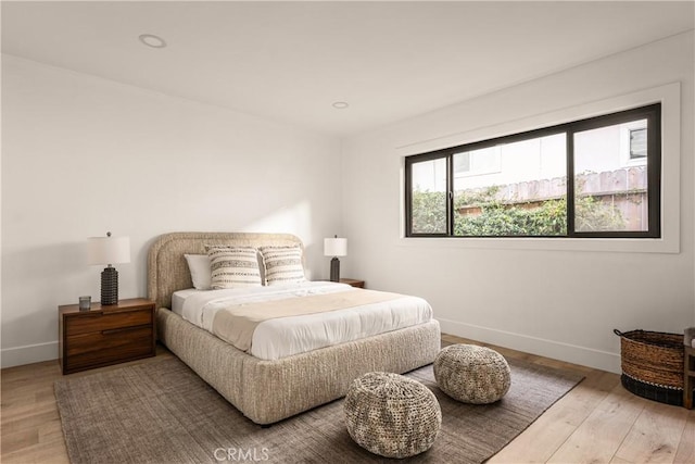 bedroom featuring hardwood / wood-style floors