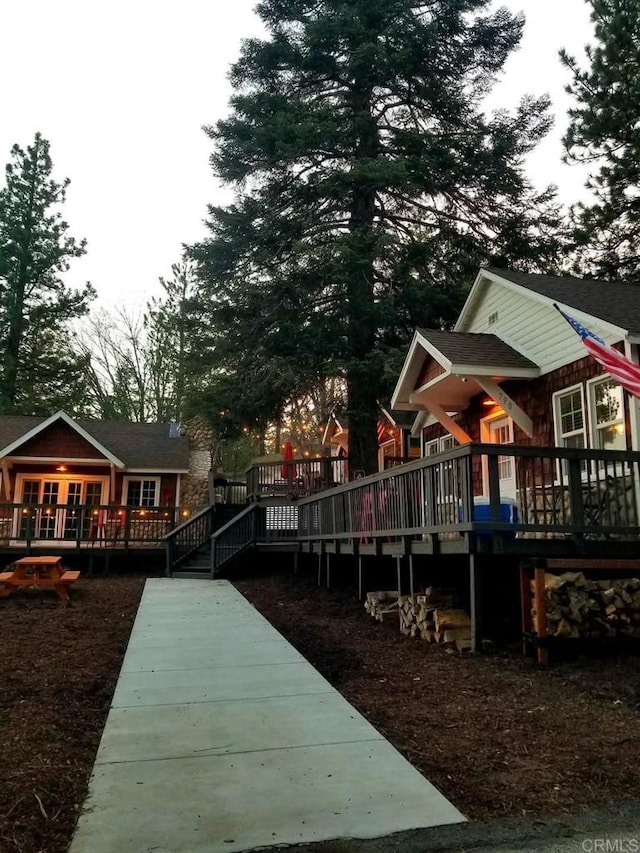 exterior space featuring a wooden deck