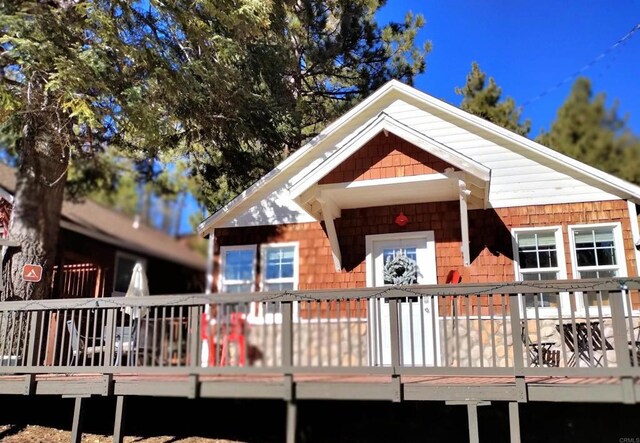 rear view of house with a deck