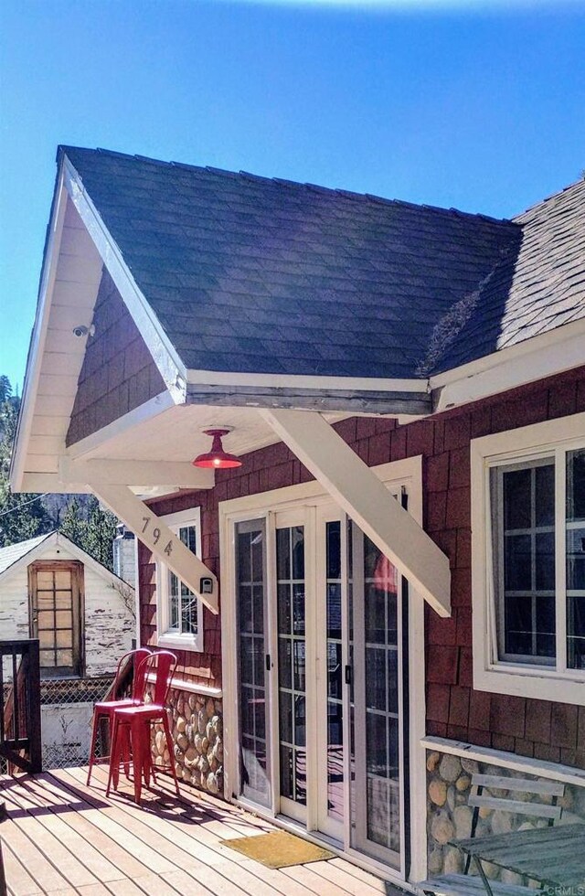 wooden terrace featuring french doors