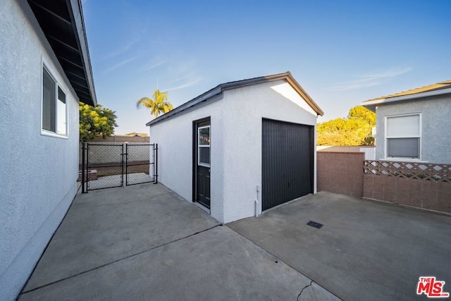 view of outdoor structure with a garage