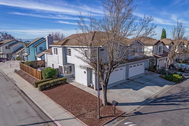 front of property with a garage