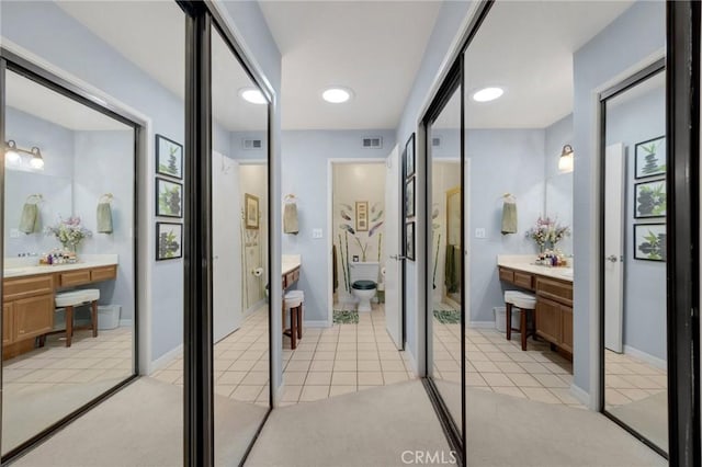 bathroom with tile patterned flooring