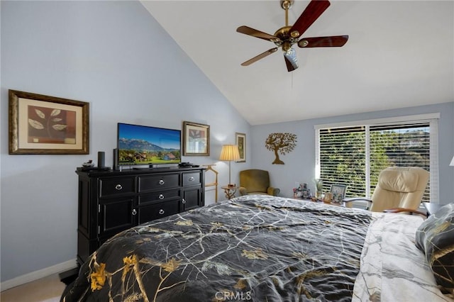 carpeted bedroom with ceiling fan and lofted ceiling