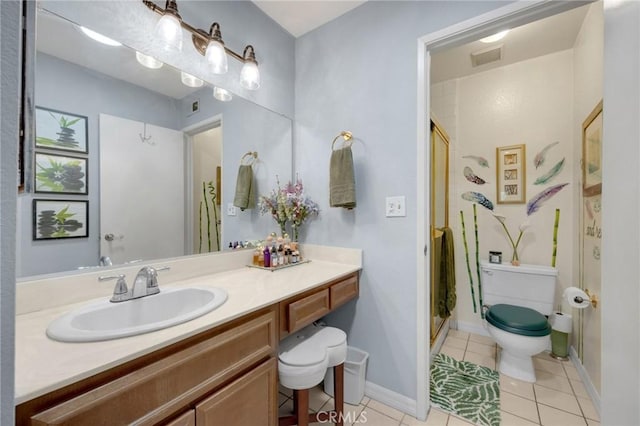 bathroom with toilet, tile patterned floors, walk in shower, and vanity