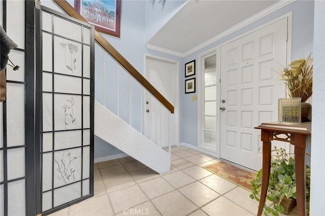 tiled foyer with crown molding