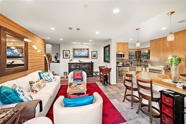 living room featuring sink