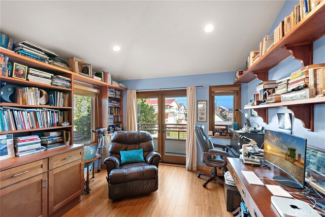 office area featuring light hardwood / wood-style flooring and french doors