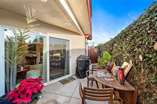 view of patio with a grill