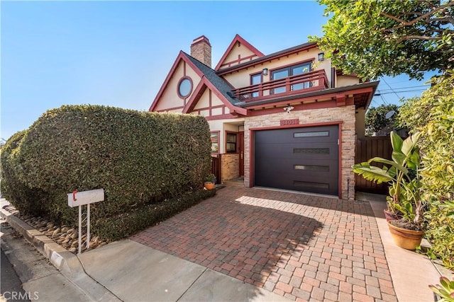 view of front of house with a balcony and a garage