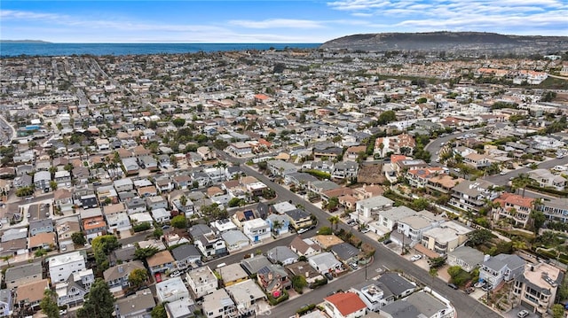 bird's eye view with a water and mountain view