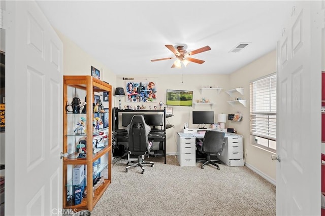 home office featuring ceiling fan and carpet floors