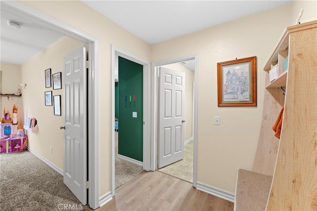 hallway featuring light wood-type flooring