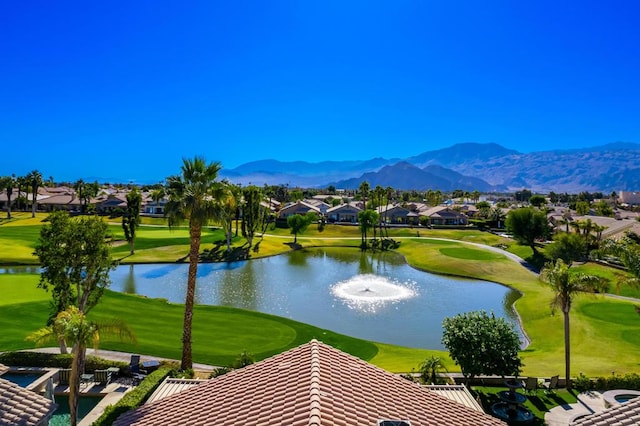 view of home's community featuring a water and mountain view