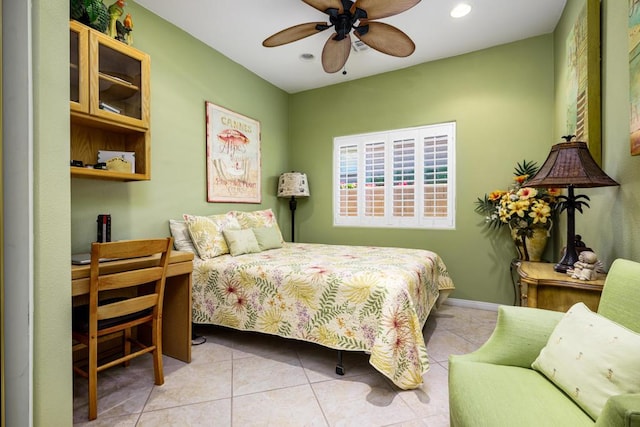 tiled bedroom with ceiling fan