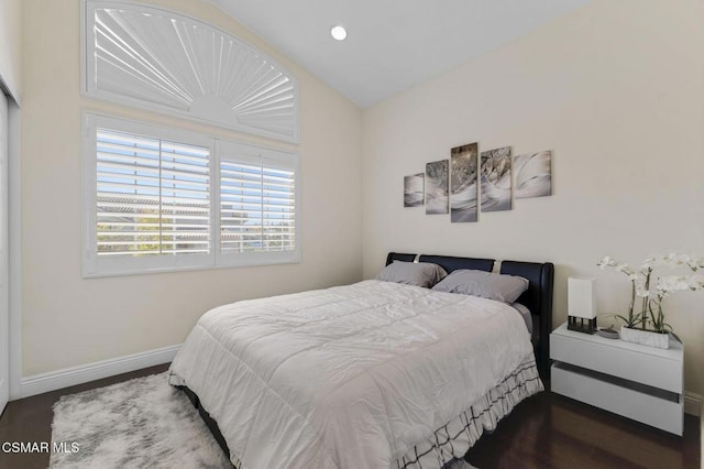 bedroom featuring dark hardwood / wood-style flooring