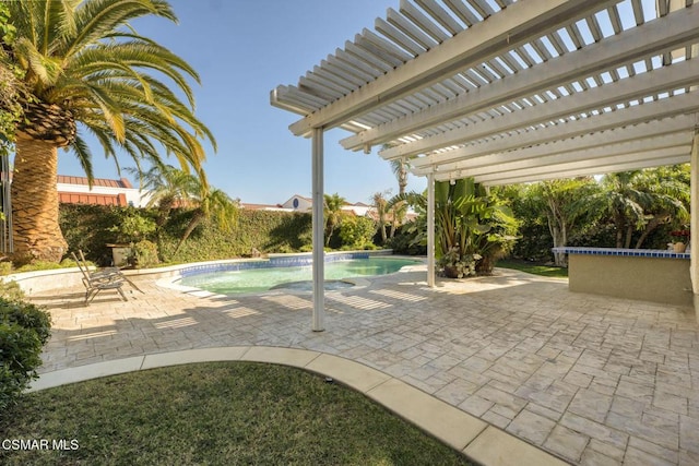 view of swimming pool with a pergola and a patio area