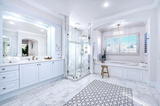 full bathroom with marble finish floor, a shower stall, crown molding, and vanity