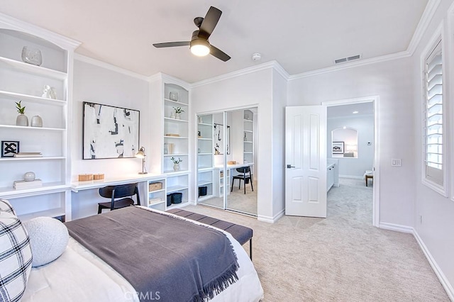 bedroom featuring arched walkways, crown molding, light colored carpet, visible vents, and baseboards