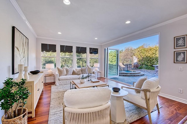 interior space with ornamental molding, recessed lighting, baseboards, and wood finished floors