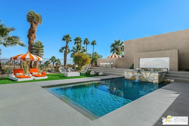 view of pool featuring a patio and pool water feature