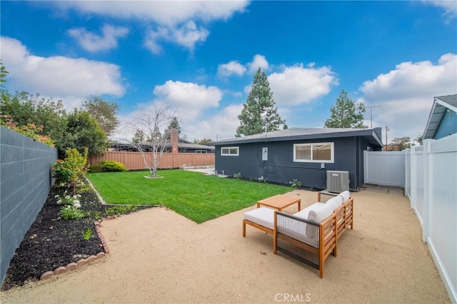 back of house with cooling unit, a patio area, and a yard