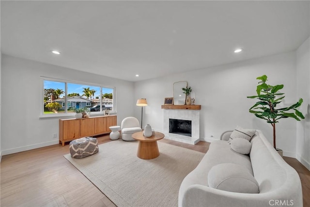 living room with light hardwood / wood-style flooring