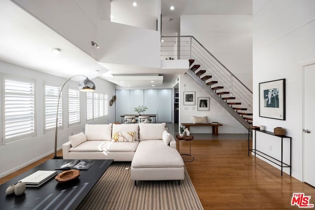 living room with dark wood-type flooring