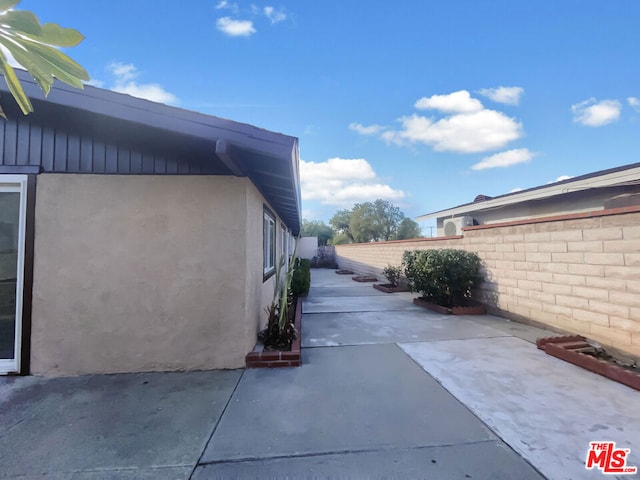 view of home's exterior featuring a patio area