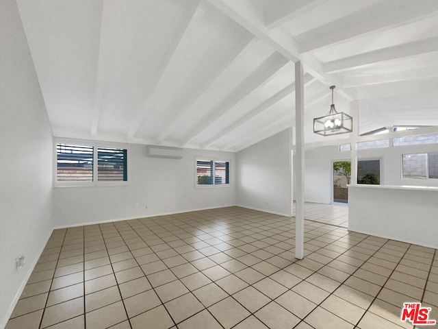 unfurnished living room with plenty of natural light, light tile patterned floors, a wall unit AC, and lofted ceiling with beams