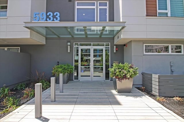 property entrance featuring french doors