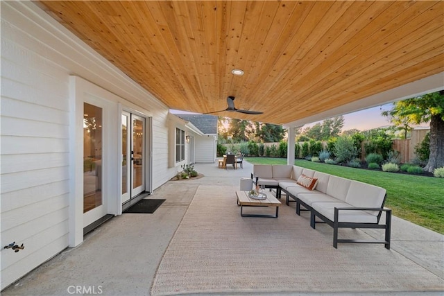 patio terrace at dusk with an outdoor hangout area