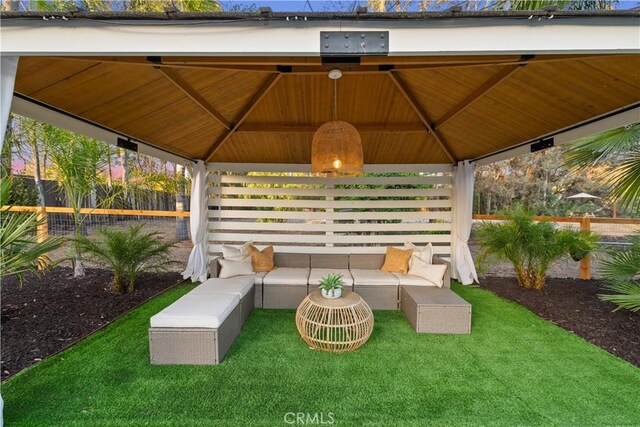 view of patio featuring a gazebo and an outdoor hangout area