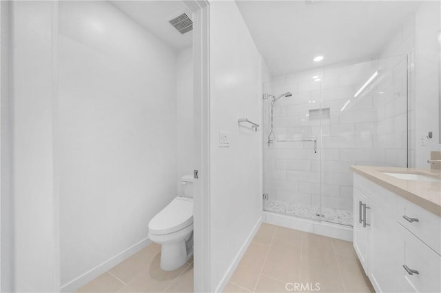 bathroom with vanity, toilet, a shower with door, and tile patterned flooring