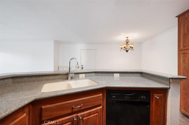 kitchen with dishwasher, sink, and a notable chandelier