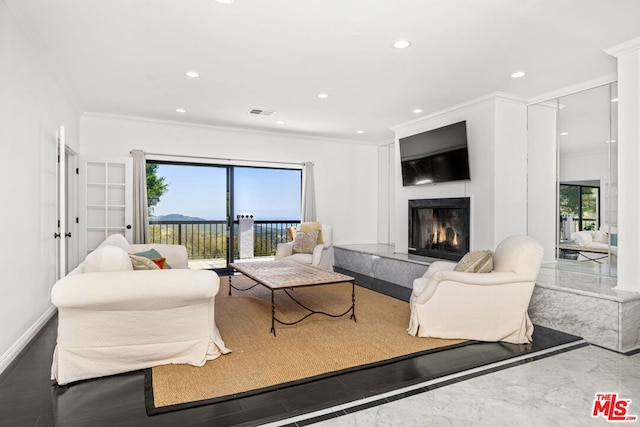 living room with ornamental molding