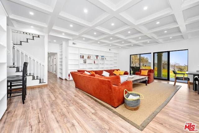 living room with light wood-type flooring, built in features, coffered ceiling, and beamed ceiling