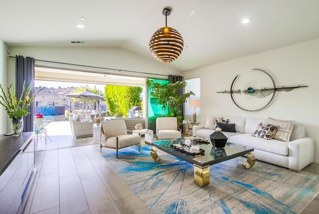 living room with lofted ceiling