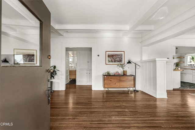 entryway featuring dark hardwood / wood-style floors, beamed ceiling, and coffered ceiling