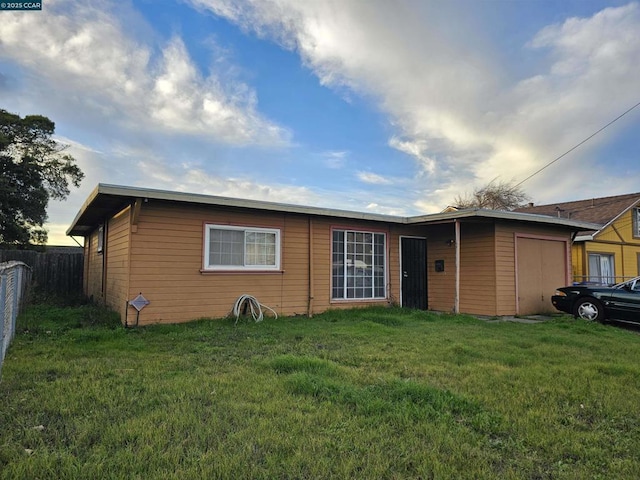 ranch-style house with a front yard