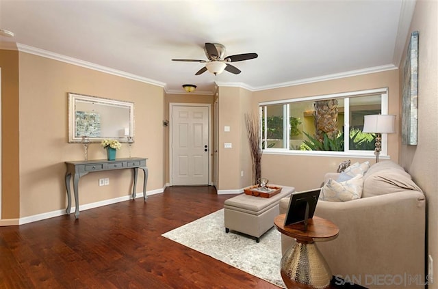 living room with ceiling fan, dark hardwood / wood-style floors, and ornamental molding