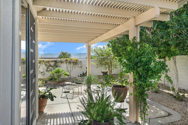 view of patio featuring a pergola